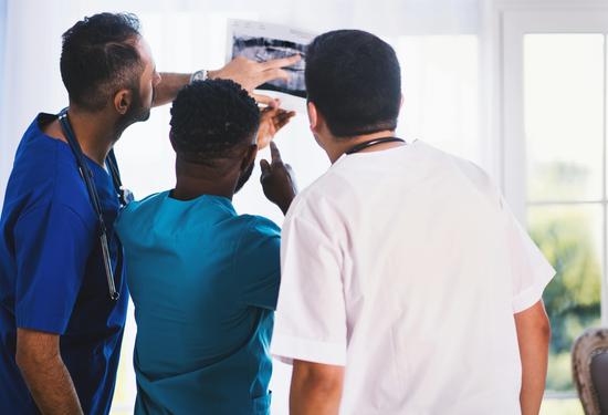 Medical Professionals Reviewing X-Ray